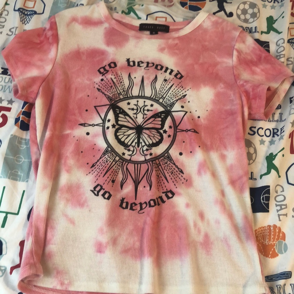 Pink polyester shirt. Brand is Faded Rose. XL kids.